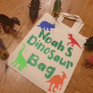 Personalised Cotton Travel Toy bag, with handles, dinosaurs ,cars and more storage.